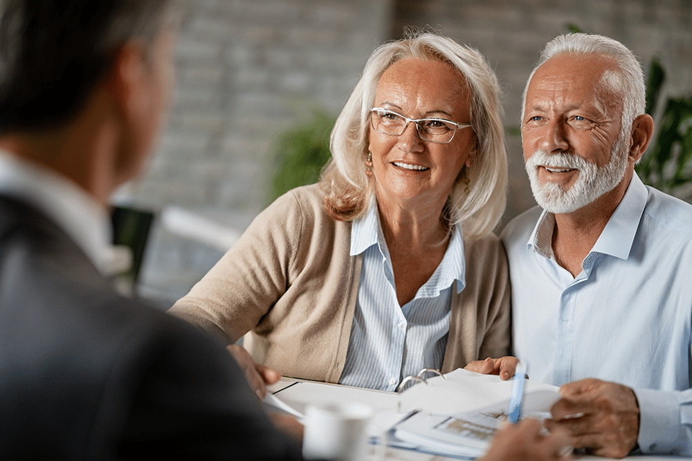 Senior couple reviewing CCRC options